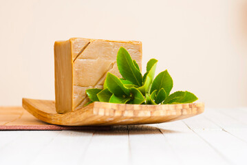Handmade soap with herbal leaves