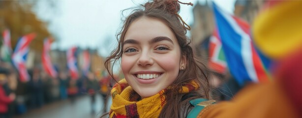 Fototapeta premium St Andrew's Day, Joyful Young Woman Taking a Selfie at Outdoor Event
