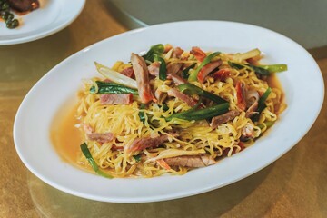 Wantan noodles, a Cantonese Chinese cuisine served dry with soy sauce and roast pork
