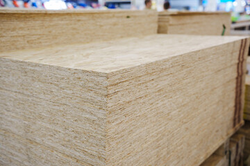 OSB board on a rack in a hardware store. sale of building materials for repair and construction. Oriented Strand Board