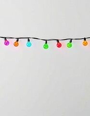 Colorful string of Christmas lights on a simple white background with copy space.
