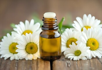A glass bottle of essential oil surrounded by white daisy flowers on a wooden surface