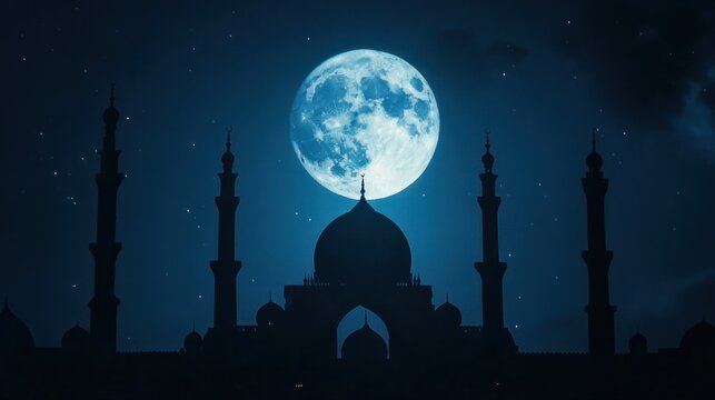 The Moon framed by the silhouette of a historic monument, glowing brightly against the night sky