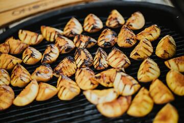 fresh peach grilling barbecue in outdoor grill party