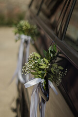 wedding bouquet on the car