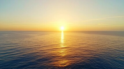 Fototapeta premium A golden sunset over a vast ocean, casting a warm glow, golden sunset, natural beauty