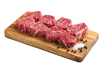 marbled beef steak cuts on a wooden board, with a sprinkle of sea salt and cracked pepper.