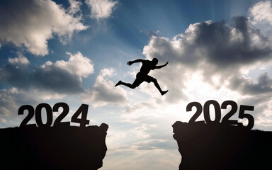 Happy new year 2025, Silhouette Man jumping from 2024 cliff to 2025 cliff on sky background. Сoncept of moving from year to year. New Year's concept.