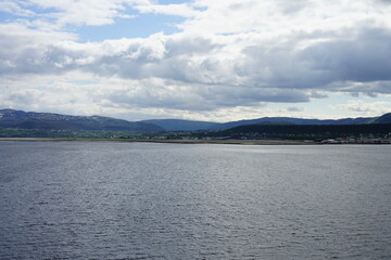 Alta Municipality, Finnmark, Norway - cloudy panorama view onto small ALF lufthavn airport from cruise ship tender located southern end of Altafjorden