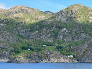 Høyvika, Kviby, Alta Municipality, Finnmark, Norway -  small remote village by the bay with red,...