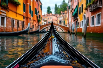 Naadloos Fotobehang Airtex A sleek gondola gently cruises under an ancient Venetian bridge, showcasing the enchanting ambiance and well-preserved architecture of Italy's aquatic city, Venice. © DKPhoto