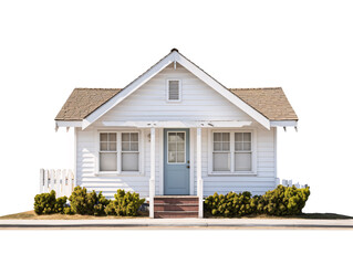 a small white house with a blue door and a white picket fence