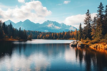 Lake with surrounding trees and mountains