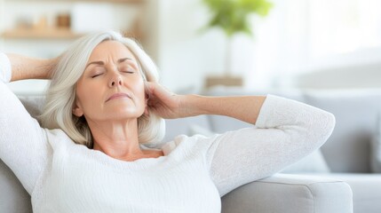2409_556.a woman in loungewear stretched out on a couch, her eyes closed and breathing deeply, portraying a moment of stress relief amidst the struggles of chronic kidney disease