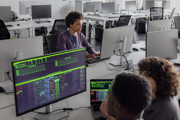 African American woman computer programmer working on software development