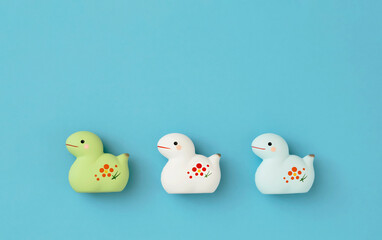  Japanese new year material. Zodiac Snake. Snake ornament on the light blue background. 日本のお正月素材。干支の巳（ヘビ）。水色背景上の巳の置物