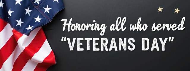 An American flag draped over a black chalkboard, with the text "Honoring all who served, Veterans Day" written in white chalk on the board.