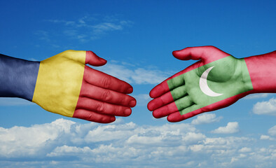 Maldives and Romania country handshaking with flags, consensus concept international co-operation illustration