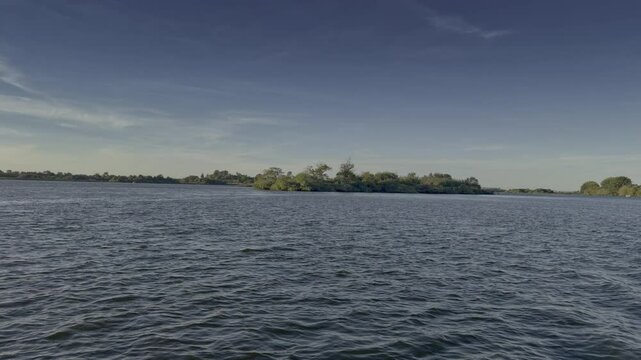Filming of the Tejo River in Portugal with sunset and trees.