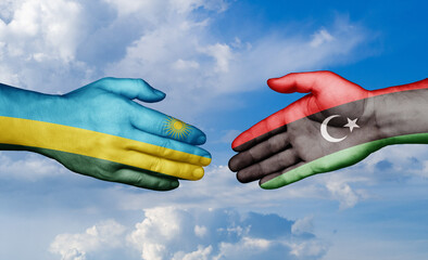 Libya and Rwanda country handshaking with flags, consensus concept international co-operation illustration