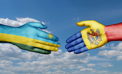 Moldova and Rwanda country handshaking with flags, consensus concept international co-operation...