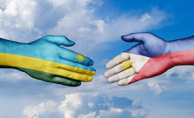 Philippines and Rwanda country handshaking with flags, consensus concept international co-operation illustration