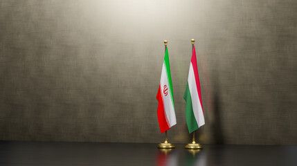 Iran and Hungary flags on table. Negotiation between Hungary and Iran. on background. 3D work and 3D image