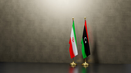 Iran and Libya flags on table. Negotiation between Libya and Iran. on background. 3D work and 3D...