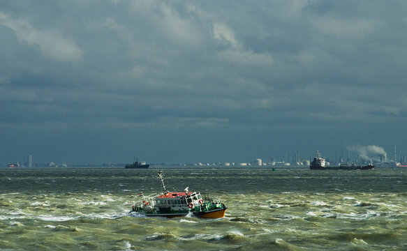 Pilot boat sailing in rough seas, Netherlands