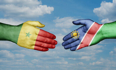 Namibia and Senegal country handshaking with flags, consensus concept international co-operation illustration