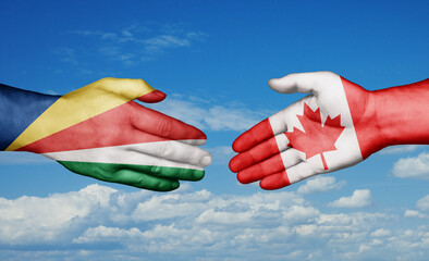 Canada and Seychelles country handshaking with flags, consensus concept international co-operation illustration