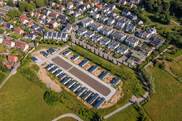 Aerial view of refugee accommodation next to a residential area with modern houses in Waiblingen, Baden-Wuerttemberg, Germany.