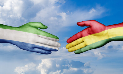 Bolivia and Sierra Leone country handshaking with flags, consensus concept international co-operation illustration