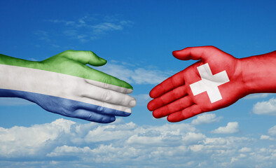 Switzerland and Sierra Leone country handshaking with flags, consensus concept international co-operation illustration