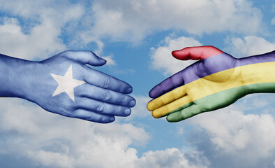 Mauritius and Somalia country handshaking with flags, consensus concept international co-operation illustration