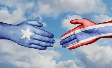 Kingdom of Thailand and Somalia country handshaking with flags, consensus concept international co-operation illustration