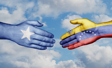 Venezuela and Somalia country handshaking with flags, consensus concept international co-operation illustration