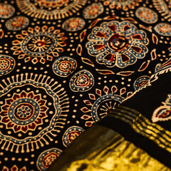 The texture or pattern of the saree (Indian traditional dress).