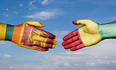 Republic of Guinea and Sri Lanka country handshaking with flags, consensus concept international co-operation illustration