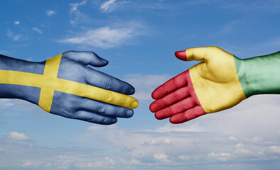 Republic of Guinea and Sweden country handshaking with flags, consensus concept international co-operation illustration