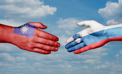Slovenia and Taiwan country handshaking with flags, consensus concept international co-operation illustration