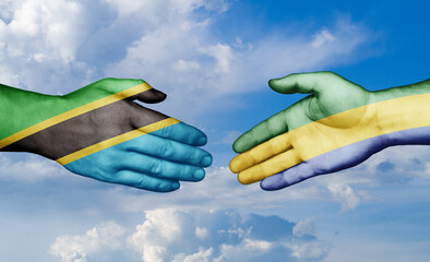 Gabon and Tanzania country handshaking with flags, consensus concept international co-operation illustration