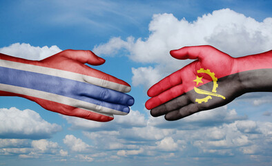 Thailand and Angola country handshaking with flags, consensus concept international co-operation illustration