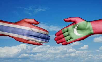 Maldives and Thailand country handshaking with flags, consensus concept international co-operation illustration