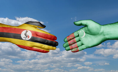 Turkmenistan and Uganda country handshaking with flags, consensus concept international co-operation illustration