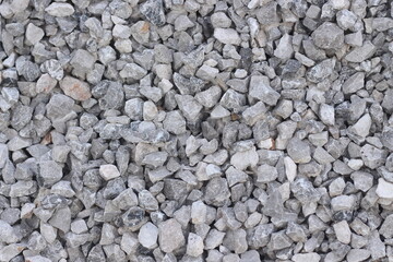 Crushed stone texture. Decorative stone in the park background