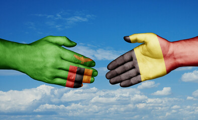 Belgium and Zambia country handshaking with flags, consensus concept international co-operation illustration