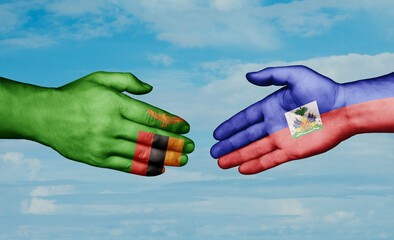 Haiti and Zambia country handshaking with flags, consensus concept international co-operation illustration