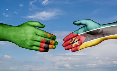 Mozambique and Zambia country handshaking with flags, consensus concept international co-operation illustration