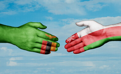 Oman and Zambia country handshaking with flags, consensus concept international co-operation illustration